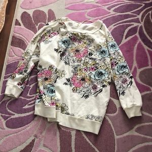 Free People sweatshirt.